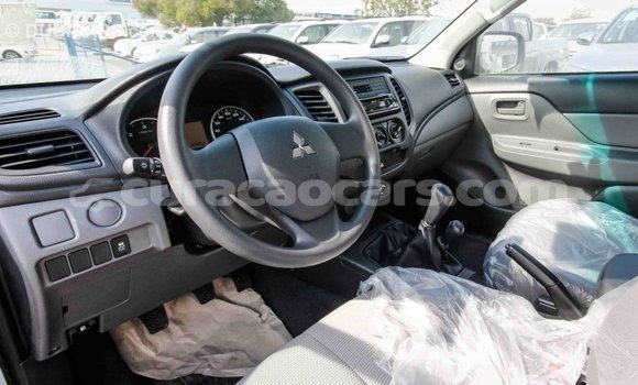 Buy Import Mitsubishi L200 White Car in Import - Dubai in Curacao