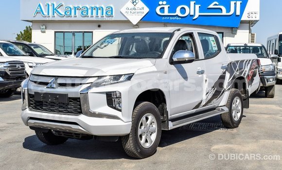 Buy Import Mitsubishi L200 White Car in Import - Dubai in Curacao Buy Import Mitsubishi L200 White Car in Import - Dubai in Curacao