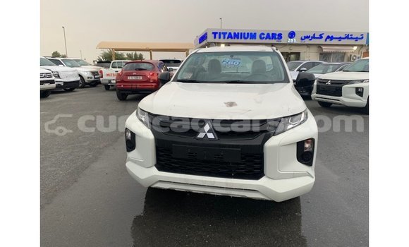 Buy Import Mitsubishi L200 White Car in Import - Dubai in Curacao Buy Import Mitsubishi L200 White Car in Import - Dubai in Curacao