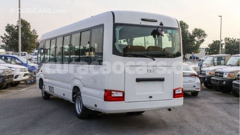 Big with watermark toyota coaster curacao import dubai 2011