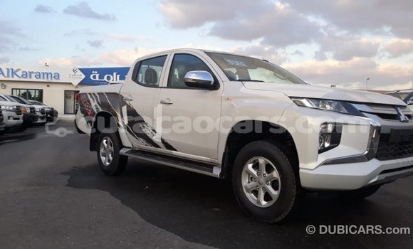 Buy Import Mitsubishi L200 White Car in Import - Dubai in Curacao Buy Import Mitsubishi L200 White Car in Import - Dubai in Curacao