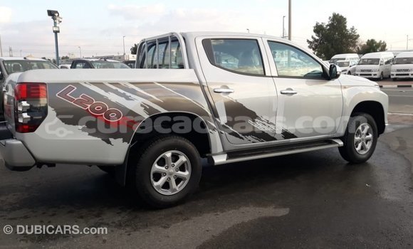 Buy Import Mitsubishi L200 White Car in Import - Dubai in Curacao Buy Import Mitsubishi L200 White Car in Import - Dubai in Curacao