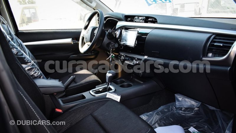 Big with watermark toyota hilux curacao import dubai 2563
