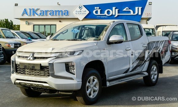 Buy Import Mitsubishi L200 White Car in Import - Dubai in Curacao Buy Import Mitsubishi L200 White Car in Import - Dubai in Curacao