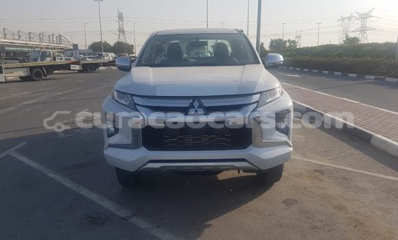 Buy Import Mitsubishi L200 White Car in Import - Dubai in Curacao Buy Import Mitsubishi L200 White Car in Import - Dubai in Curacao