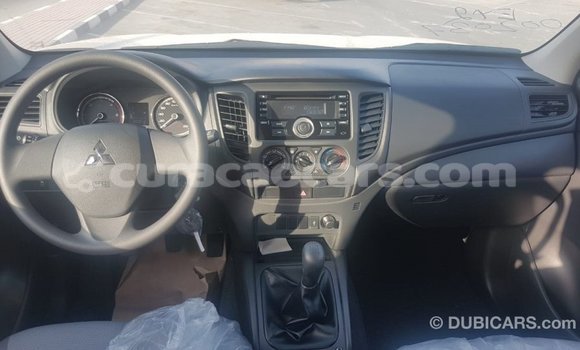 Buy Import Mitsubishi L200 White Car in Import - Dubai in Curacao Buy Import Mitsubishi L200 White Car in Import - Dubai in Curacao