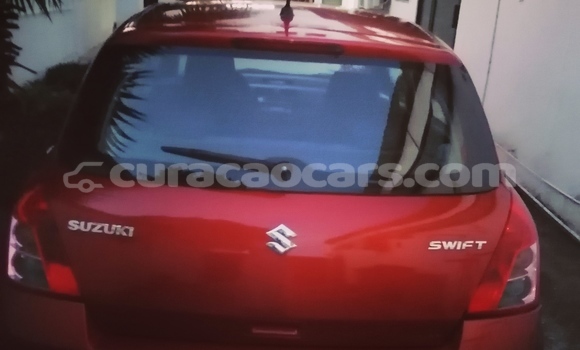 Buy Used Suzuki Swift Red Car in Willemstad in Curacao Buy Used Suzuki Swift Red Car in Willemstad in Curacao