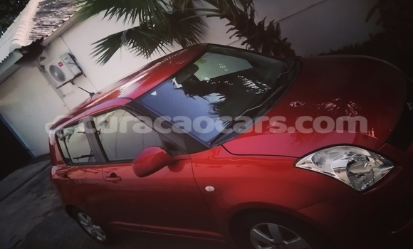 Buy Used Suzuki Swift Red Car in Willemstad in Curacao Buy Used Suzuki Swift Red Car in Willemstad in Curacao