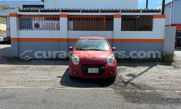 Buy Used Suzuki Celerio Red Car in Lagún in Curacao