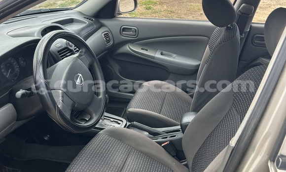 Buy Used Nissan Almera Beige Car in Willemstad in Curacao Buy Used Nissan Almera Beige Car in Willemstad in Curacao